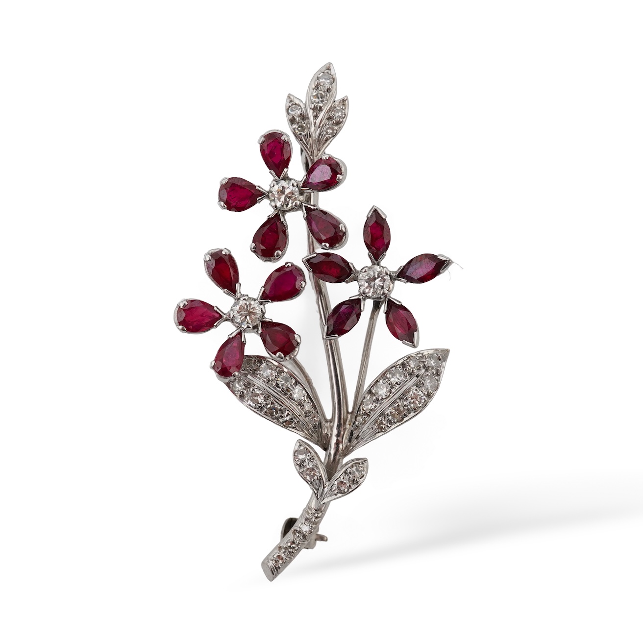 A ruby and diamond floral spray brooch